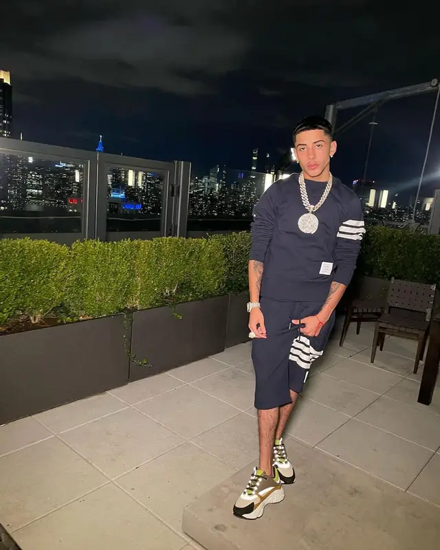 J.I. outfit in Thom Browne and Dior, 2022