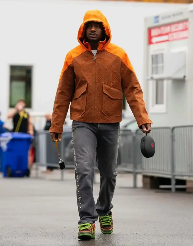 Stefon Diggs outfit in Louis Vuitton, Kapital, and Nike, 2022