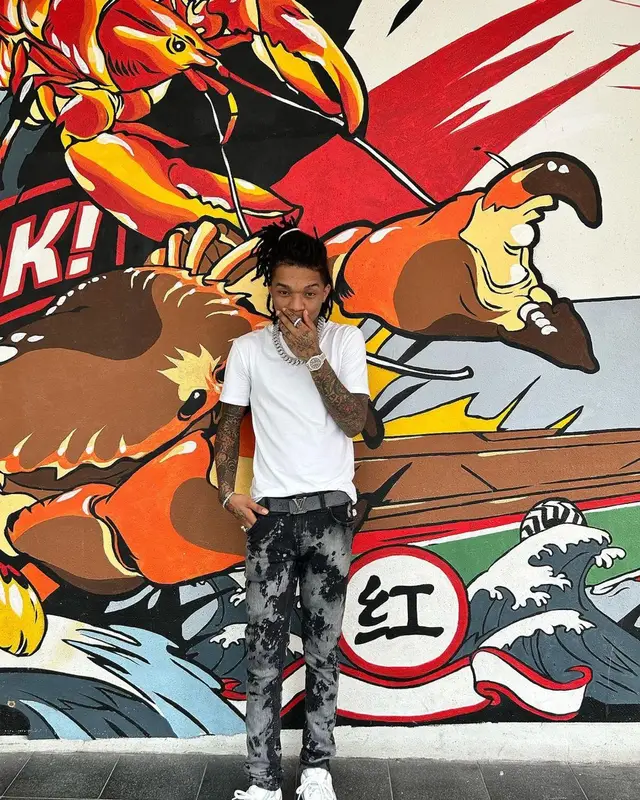 Swae Lee outfit in Hanes, Nudie Jeans, and Louis Vuitton, 2022