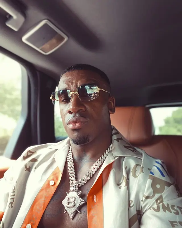 Bugzy Malone outfit in Amiri, Dior, and Zig-Zag World, 2022