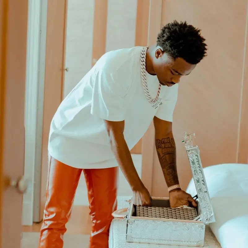 Roddy Ricch outfit in Louis Vuitton, Nyrva, and Nike, 2022