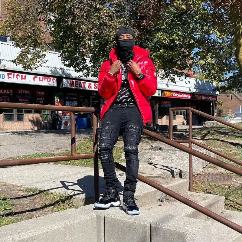 Pressa outfit in Moncler, Balenciaga, and Louis Vuitton, 2022