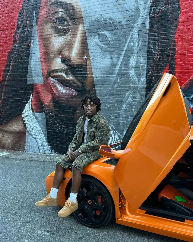 Jacquees outfit in Etro, Supreme, and Nike, 2022