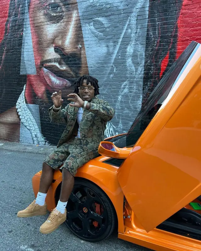 Jacquees outfit in Etro, Supreme, and Nike, 2022