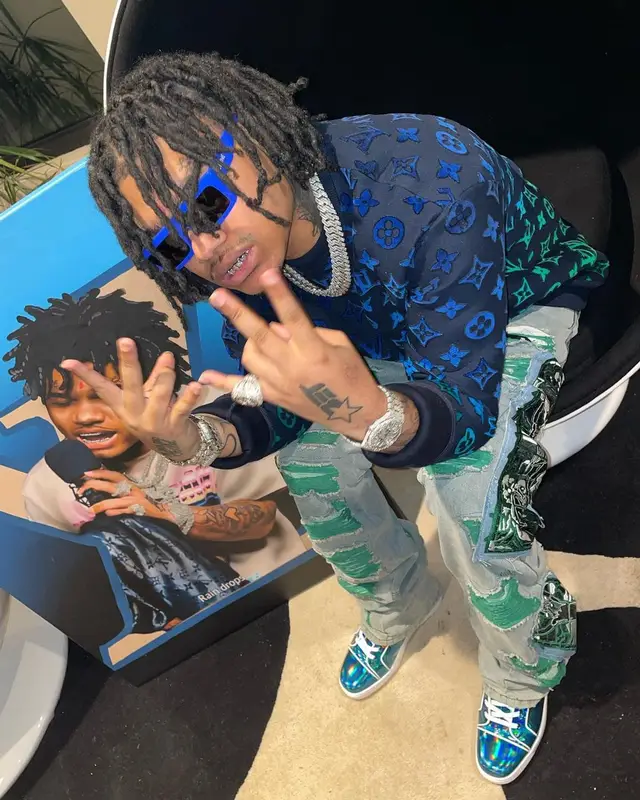 No Cap outfit in Louis Vuitton, Who Decides War, and Celine, 2022