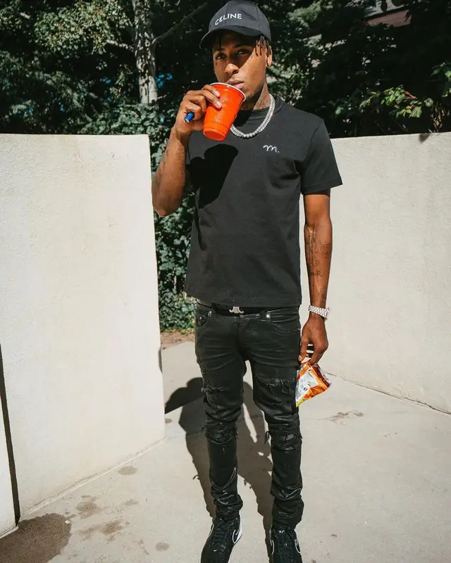 NBA YoungBoy outfit in Sacai, Amiri, and Celine, 2022