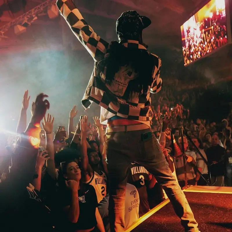 Meek Mill outfit in Amiri, Nike, and Louis Vuitton, 2022