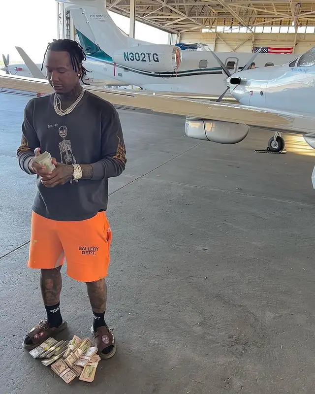Moneybagg Yo outfit in Gallery Dept., Cactus Jack, and Dior, 2022