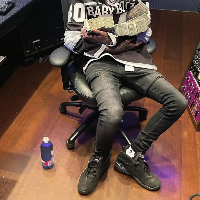 Baby Smoove outfit in Purple Brand, Jordan, and Alexander McQueen, 2022