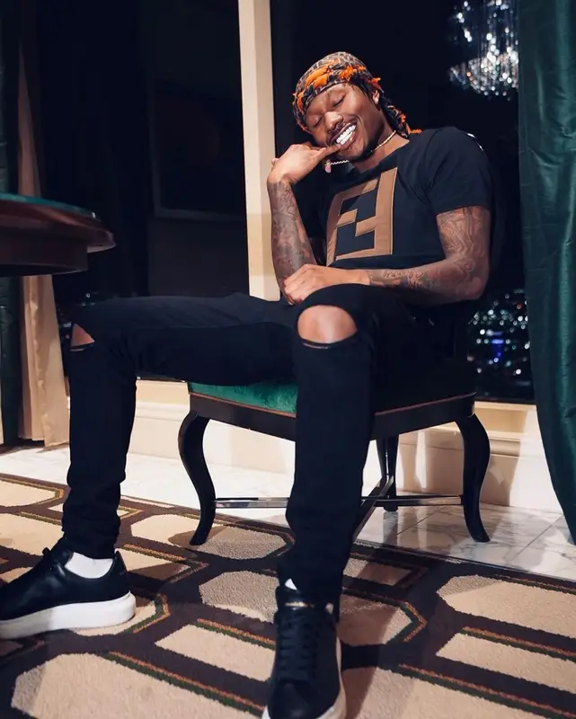 Duke Dennis outfit in Alexander McQueen and Fendi, 2022