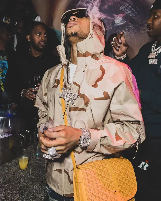 Lil Migo outfit in Supreme, Goyard, and Balenciaga, 2022