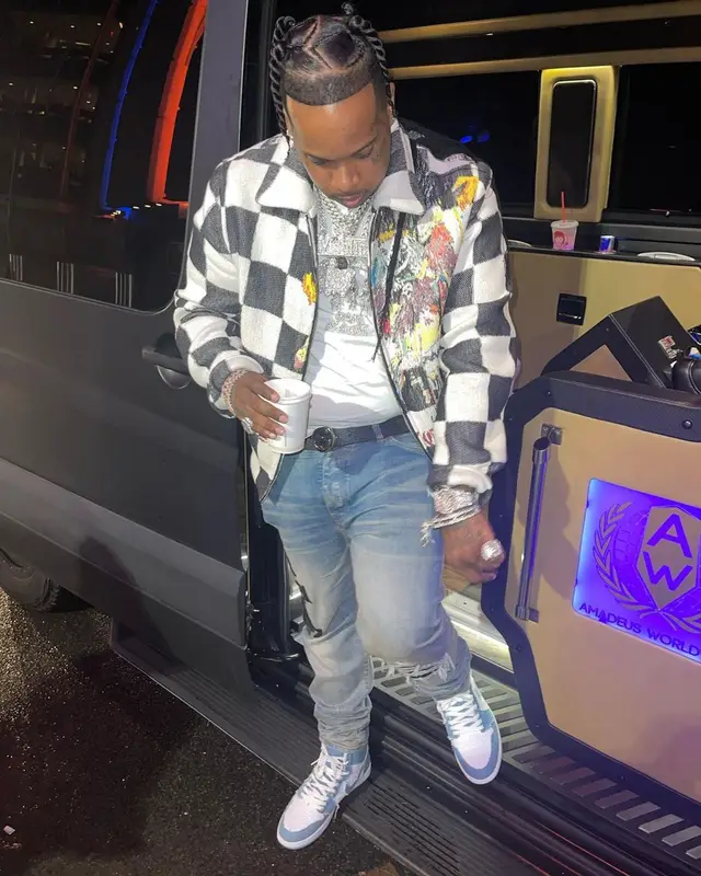 Finesse2tymes outfit in Amiri, Nike, and Gucci, 2022