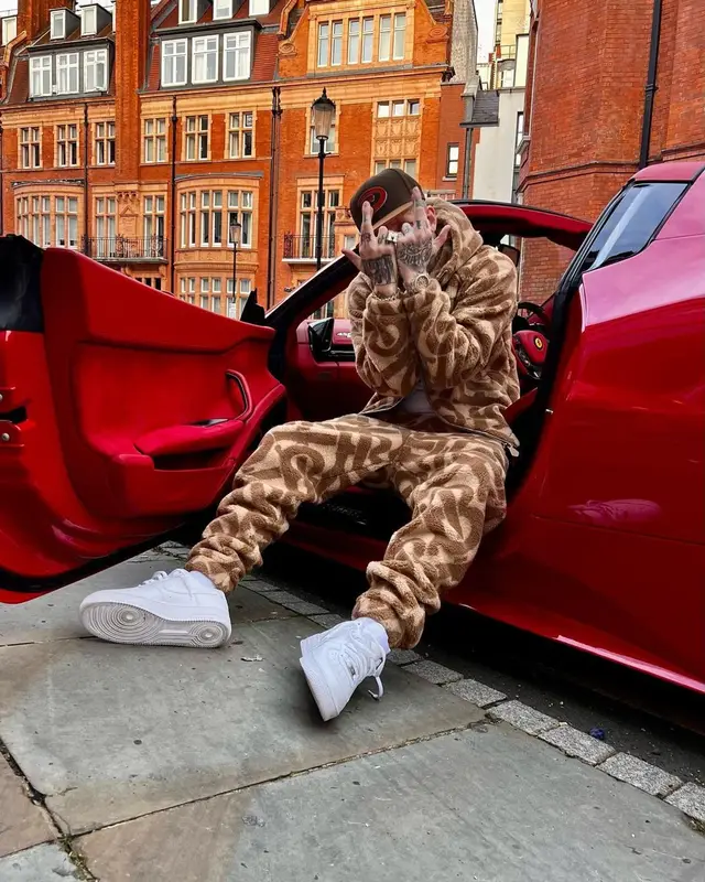 Millyz outfit in Burberry, Nike, and New Era, 2022