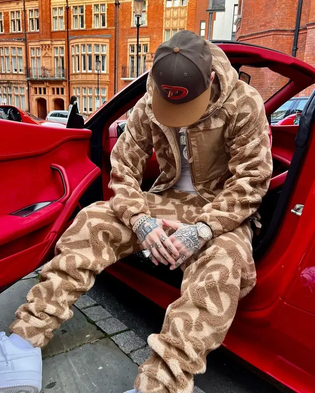 Millyz outfit in Burberry, Nike, and New Era, 2022