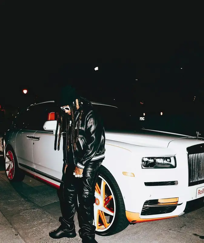 Icewear Vezzo outfit in Avirex, Versace, and Heron Preston, 2022