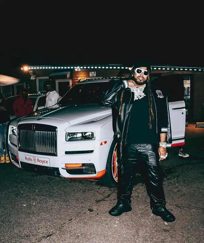 Icewear Vezzo outfit in Avirex, Versace, and Heron Preston, 2022