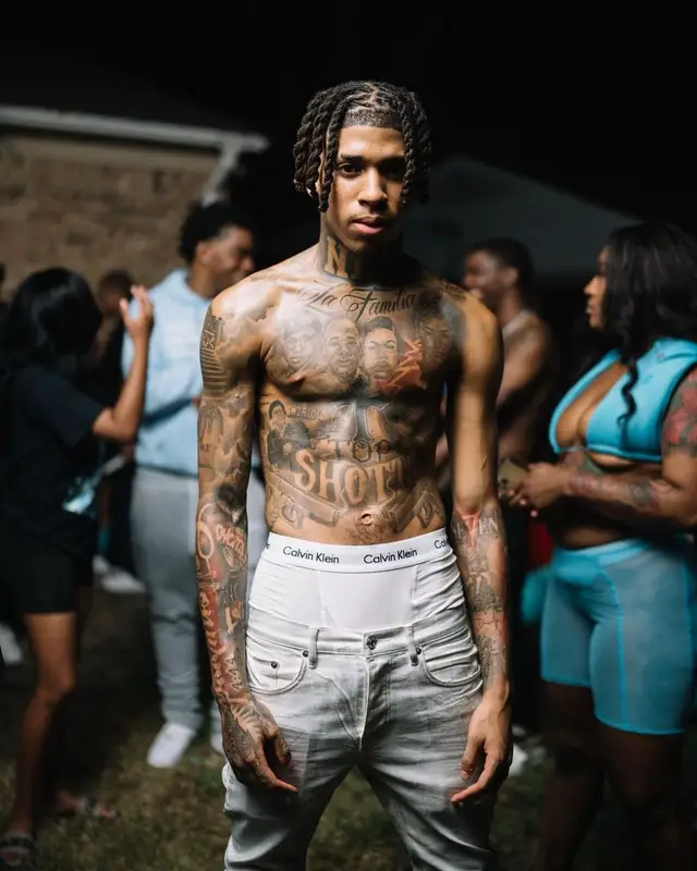NLE Choppa outfit in Purple Brand, Amiri, and Calvin Klein, 2022