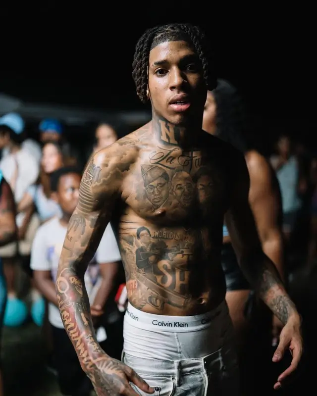 NLE Choppa outfit in Purple Brand, Amiri, and Calvin Klein, 2022