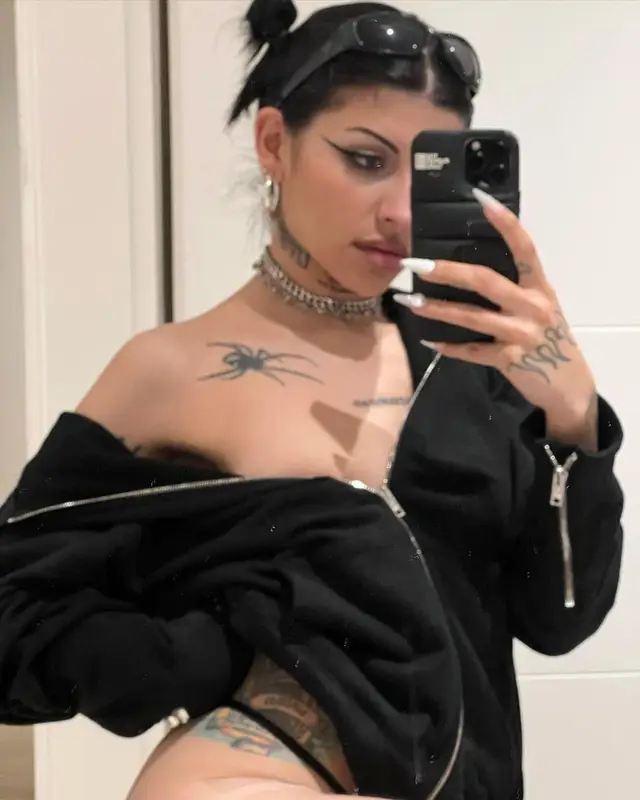Cazzu outfit in Rick Owens, Supreme, and Hanes, 2022