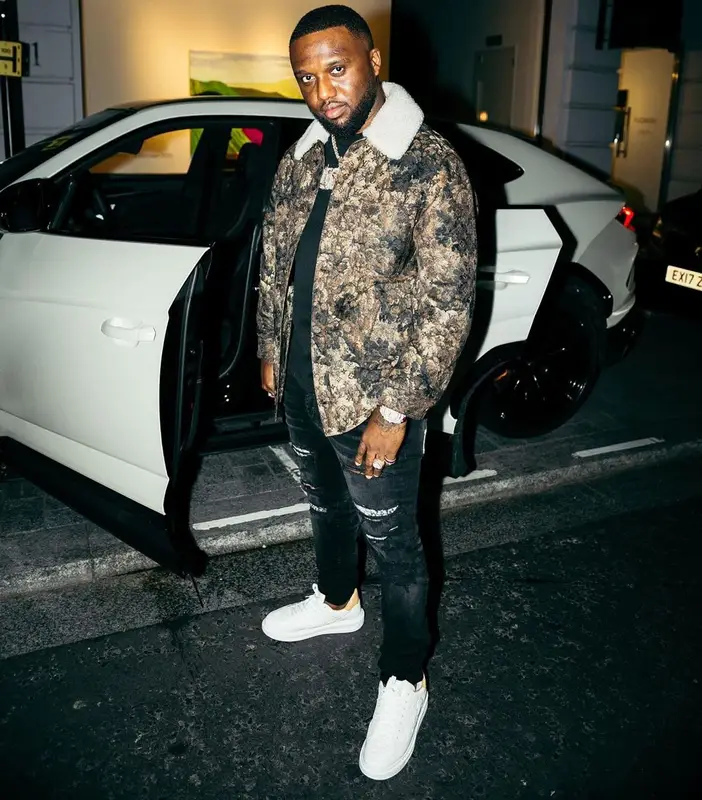 Headie One outfit in Louis Vuitton and Amiri, 2022