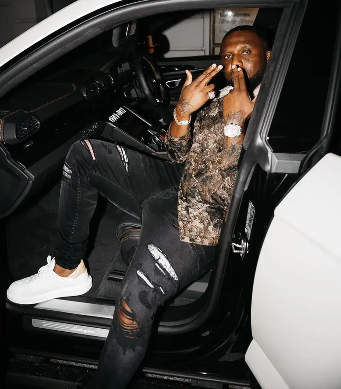 Headie One outfit in Louis Vuitton and Amiri, 2022