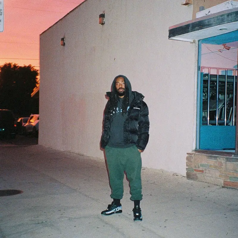 DRAM outfit in Daily Paper, Champion, and Nike, 2021