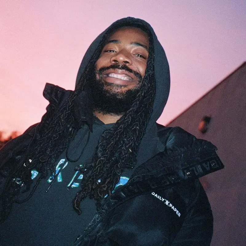 DRAM outfit in Daily Paper, Champion, and Nike, 2021