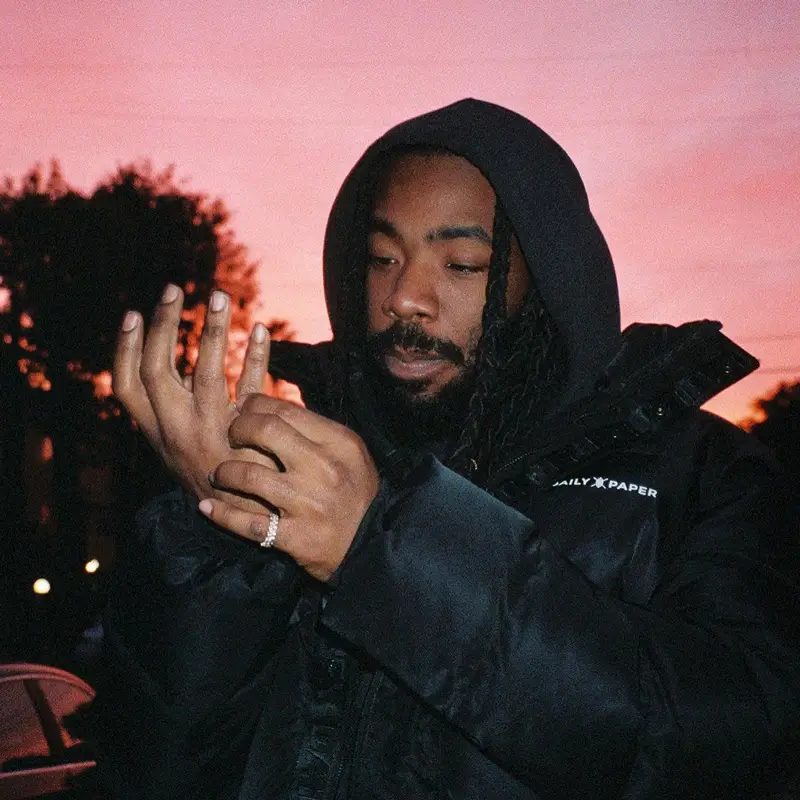 DRAM outfit in Daily Paper, Champion, and Nike, 2021
