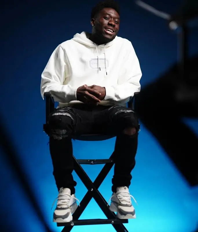 Alphonso Davies outfit in Dior and Amiri, 2022