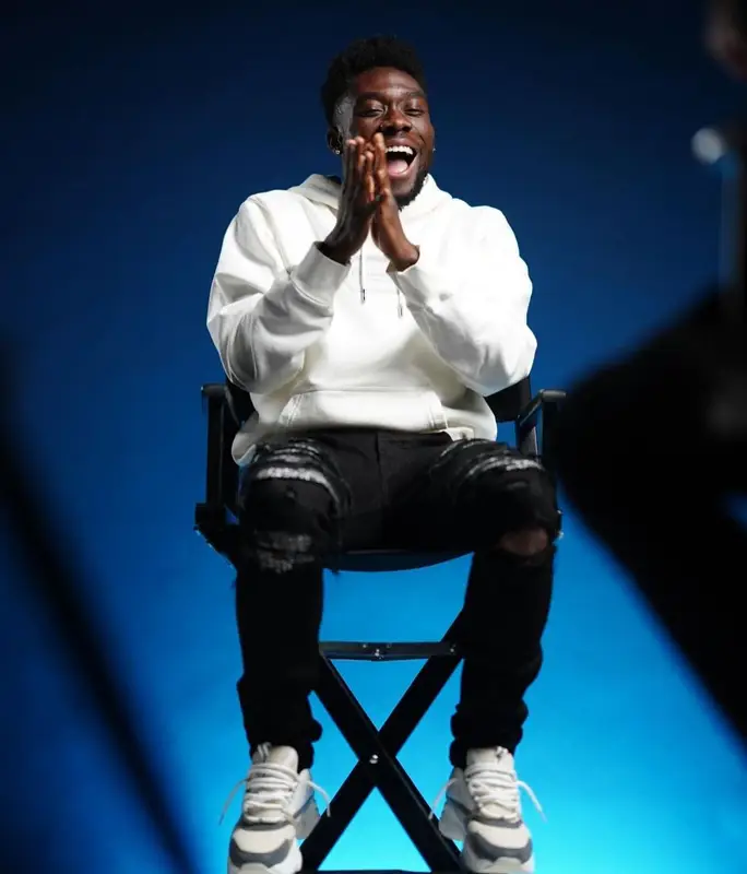 Alphonso Davies outfit in Dior and Amiri, 2022