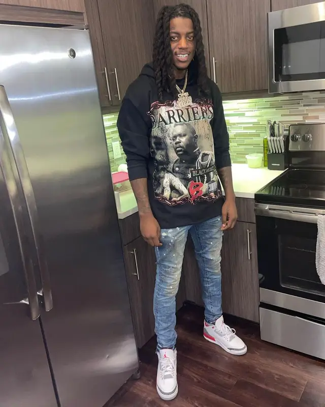 OMB Peezy outfit in Barriers, Purple Brand, and Jordan, 2022