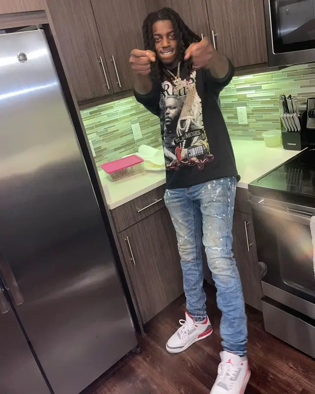 OMB Peezy outfit in Barriers, Purple Brand, and Jordan, 2022