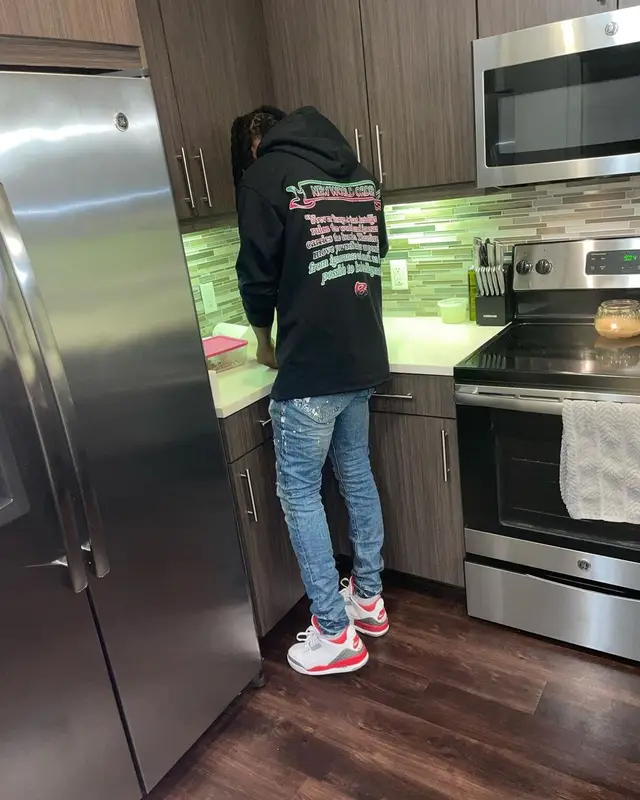OMB Peezy outfit in Barriers, Purple Brand, and Jordan, 2022
