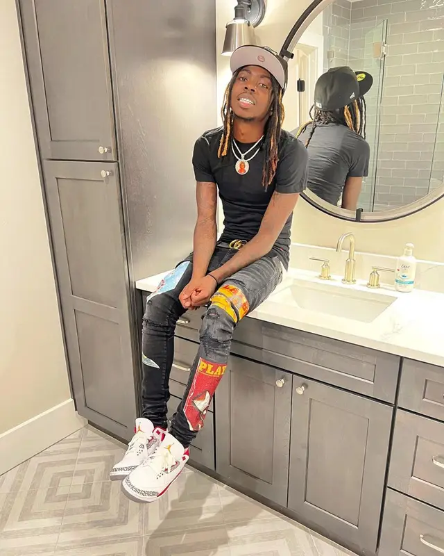 Dee Watkins outfit in Polo Ralph Lauren, New Era, and Louis Vuitton, 2022