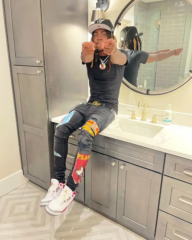 Dee Watkins outfit in Polo Ralph Lauren, New Era, and Louis Vuitton, 2022
