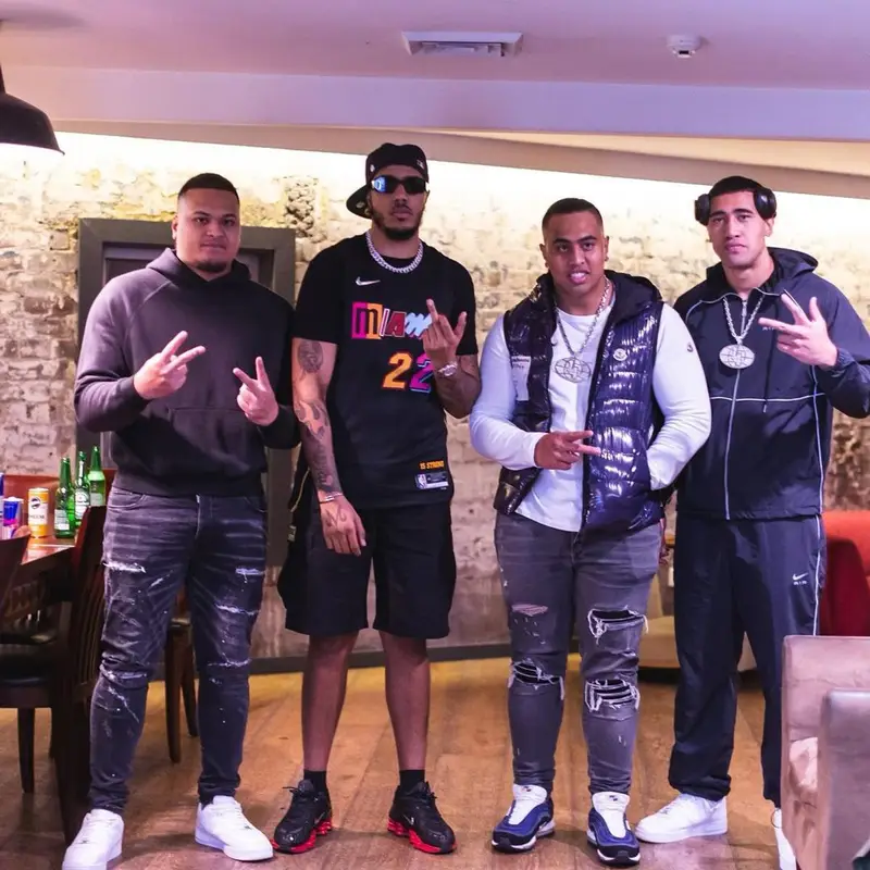 AJ Tracey outfit in Nike, Skepta Merch, and Prada, 2022