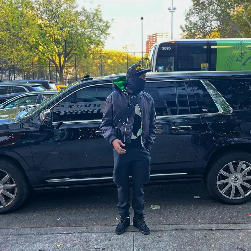 Meek Mill outfit in Bottega Veneta, Nike, and Louis Vuitton, 2022