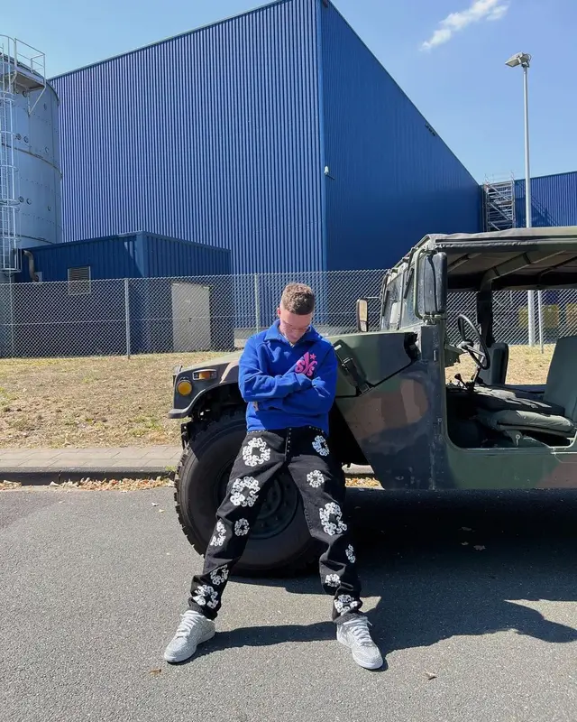Justin outfit in Nike, Chanel, and Cartier, 2022