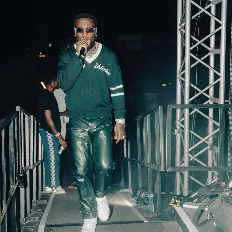 Burna Boy outfit in Valentino, Bottega Veneta, and Louis Vuitton, 2022