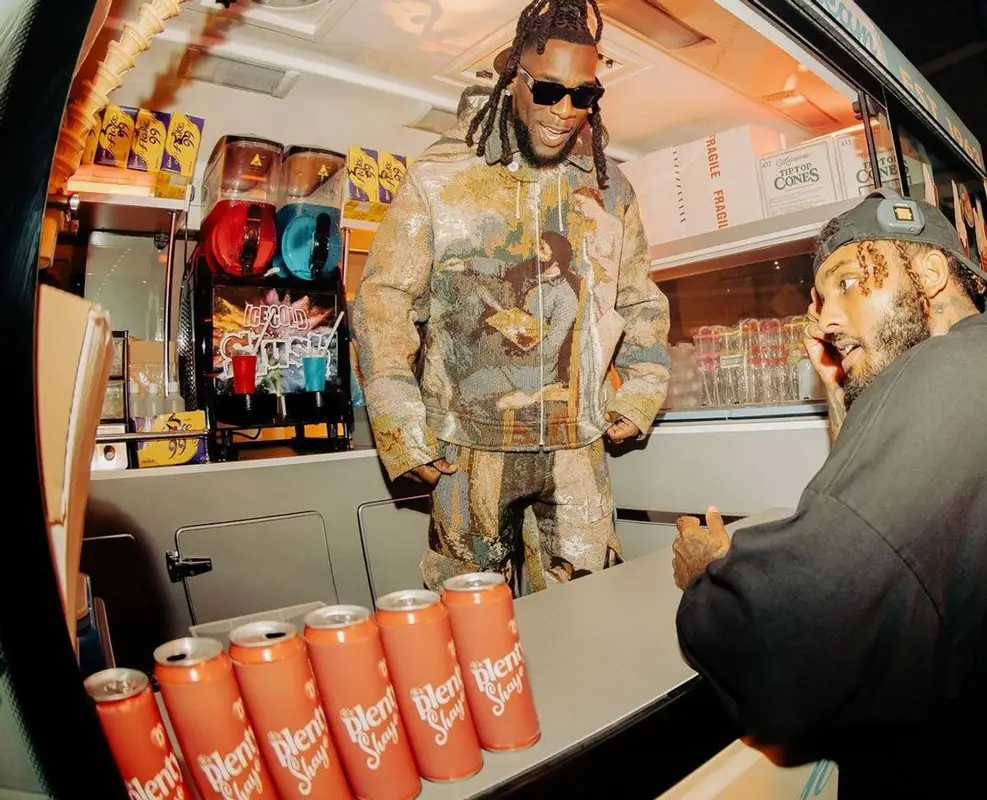 Burna Boy outfit in Louis Vuitton, 2022