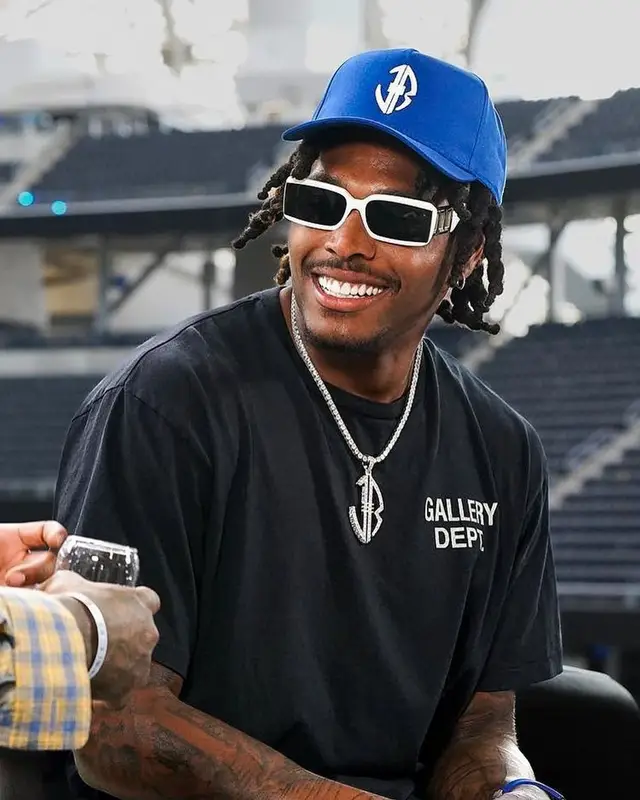 Jalen Ramsey outfit in Gallery Dept., Nike, and Travis Scott Merch, 2022