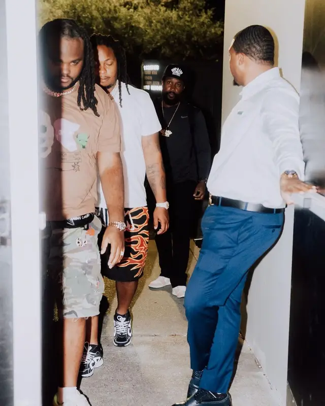 Tee Grizzley outfit in Dior, Saint Laurent, and Travis Scott Merch, 2022