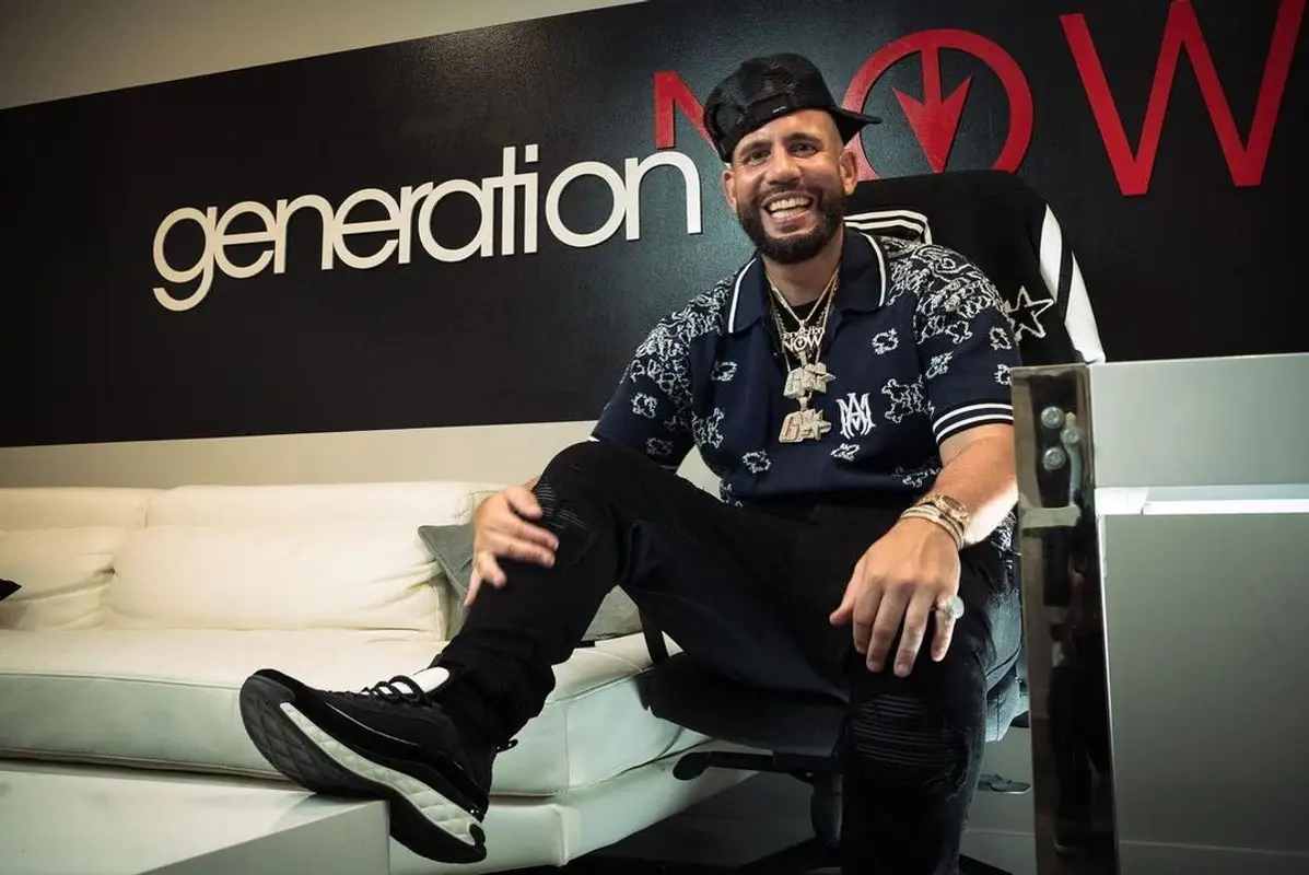 DJ Drama outfit in Chanel and Amiri, 2022