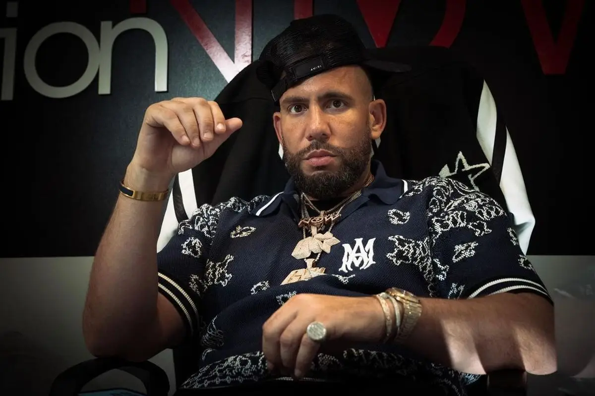 DJ Drama outfit in Chanel and Amiri, 2022