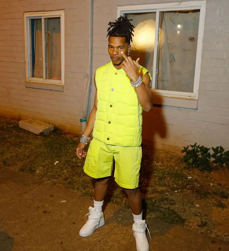 Lil Baby outfit in Bottega Veneta, Louis Vuitton, and Nike, 2022