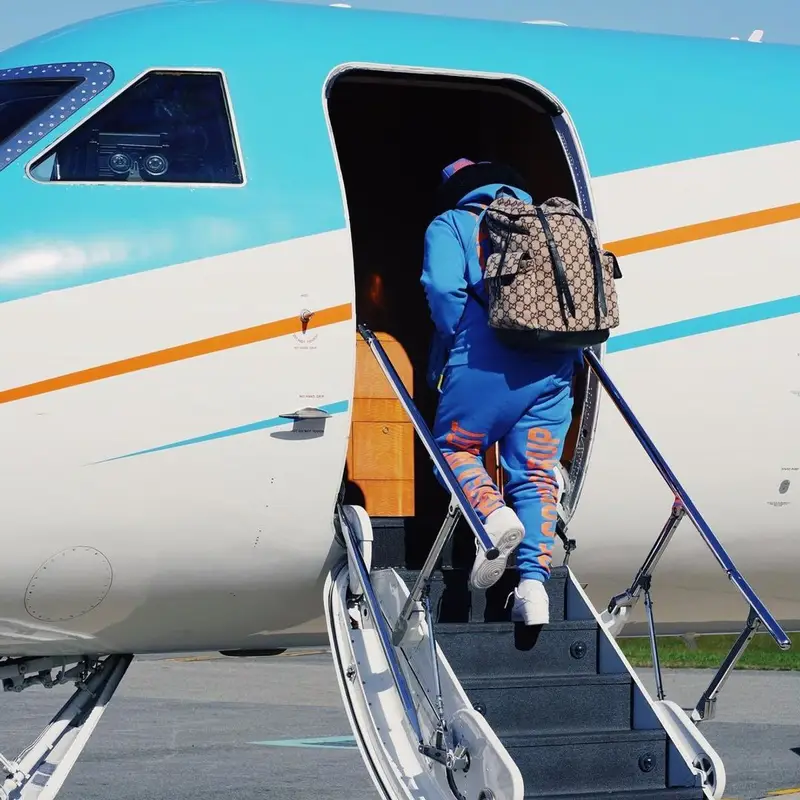 Doe Boy outfit in Nike, Goyard, and Gucci, 2022