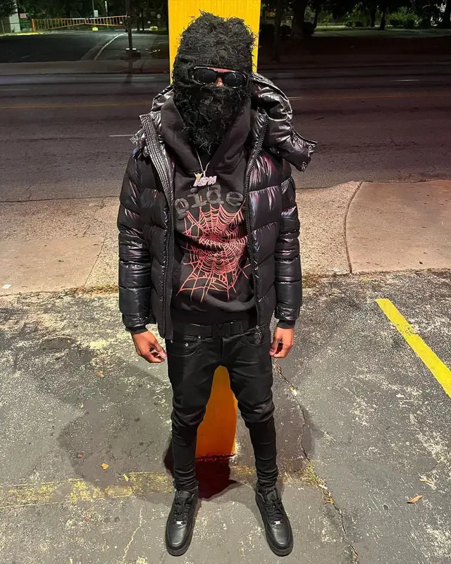 Lil Darius outfit in Moncler, Young Thug Merch, and Spider Worldwide, 2022