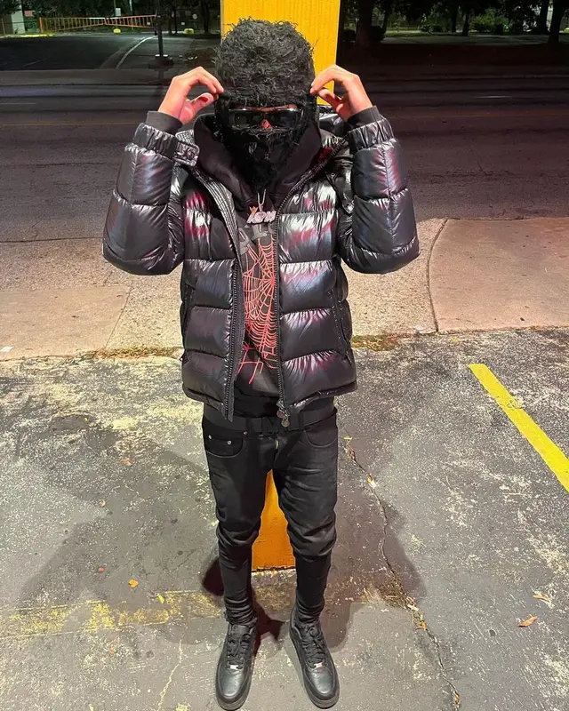 Lil Darius outfit in Moncler, Young Thug Merch, and Spider Worldwide, 2022