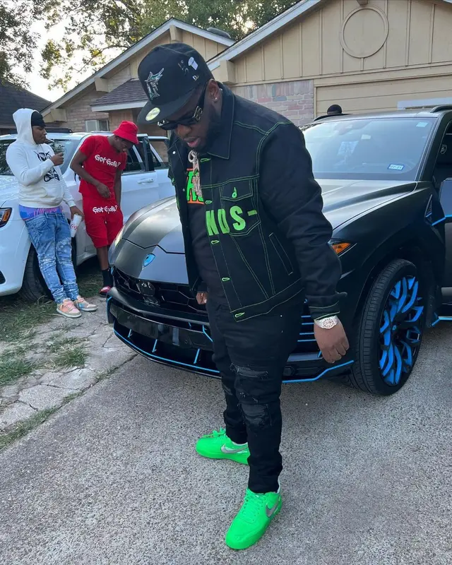 Maxo Kream outfit in Vlone, Balenciaga, and New Era, 2022