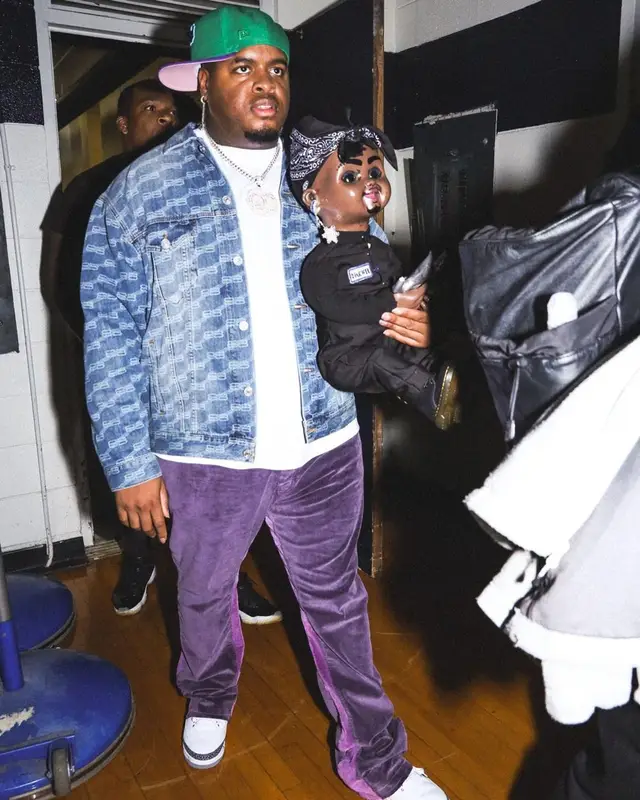 Duke Deuce outfit in Balenciaga, Mnml, and New Era, 2022